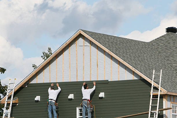 Professional Emergency Siding Repair technician working in Bellwood, PA